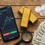 Flat lay of MCX trading app gold bar silver coins and rupee notes representing Indian commodity market investment in 2026. Invest in Indian Commodity Market